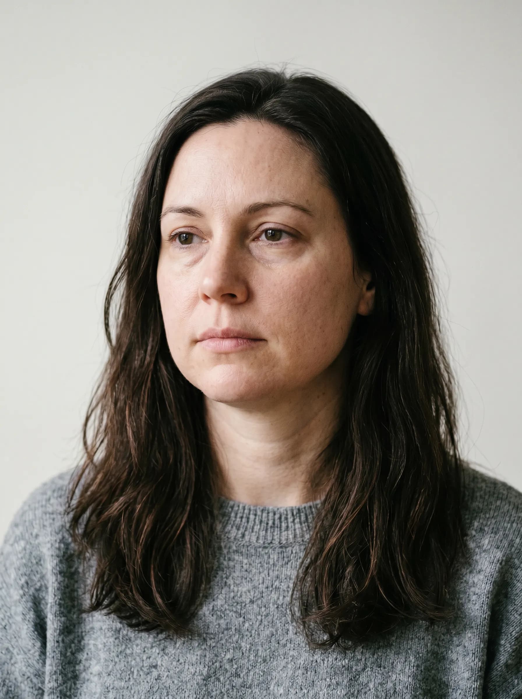Editorial reconstruction of Carissa with subtle facial puffiness consistent with low-thyroid state
