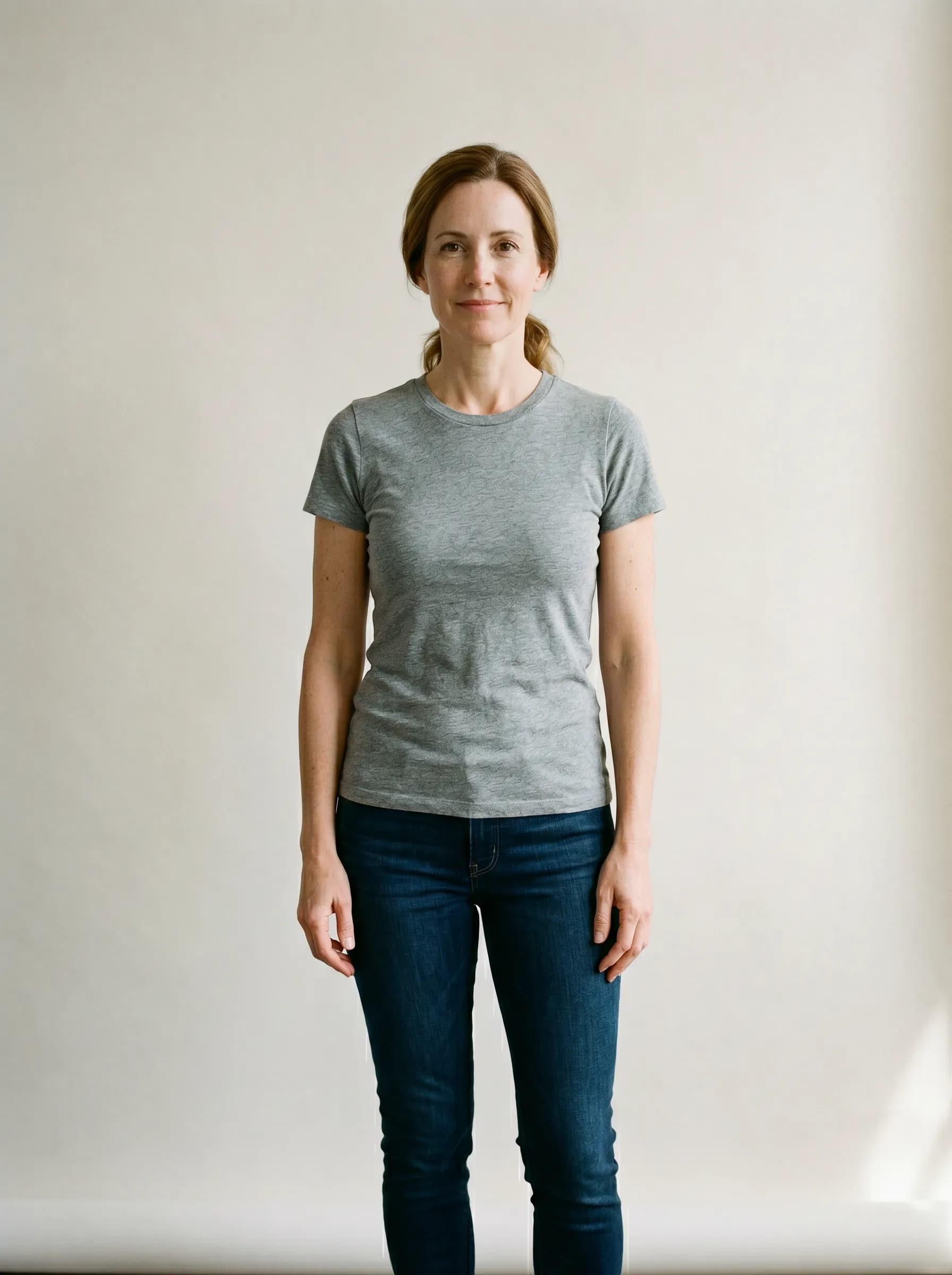 Editorial reconstruction of Danielle six months later after tapering off semaglutide, same backdrop and lighting