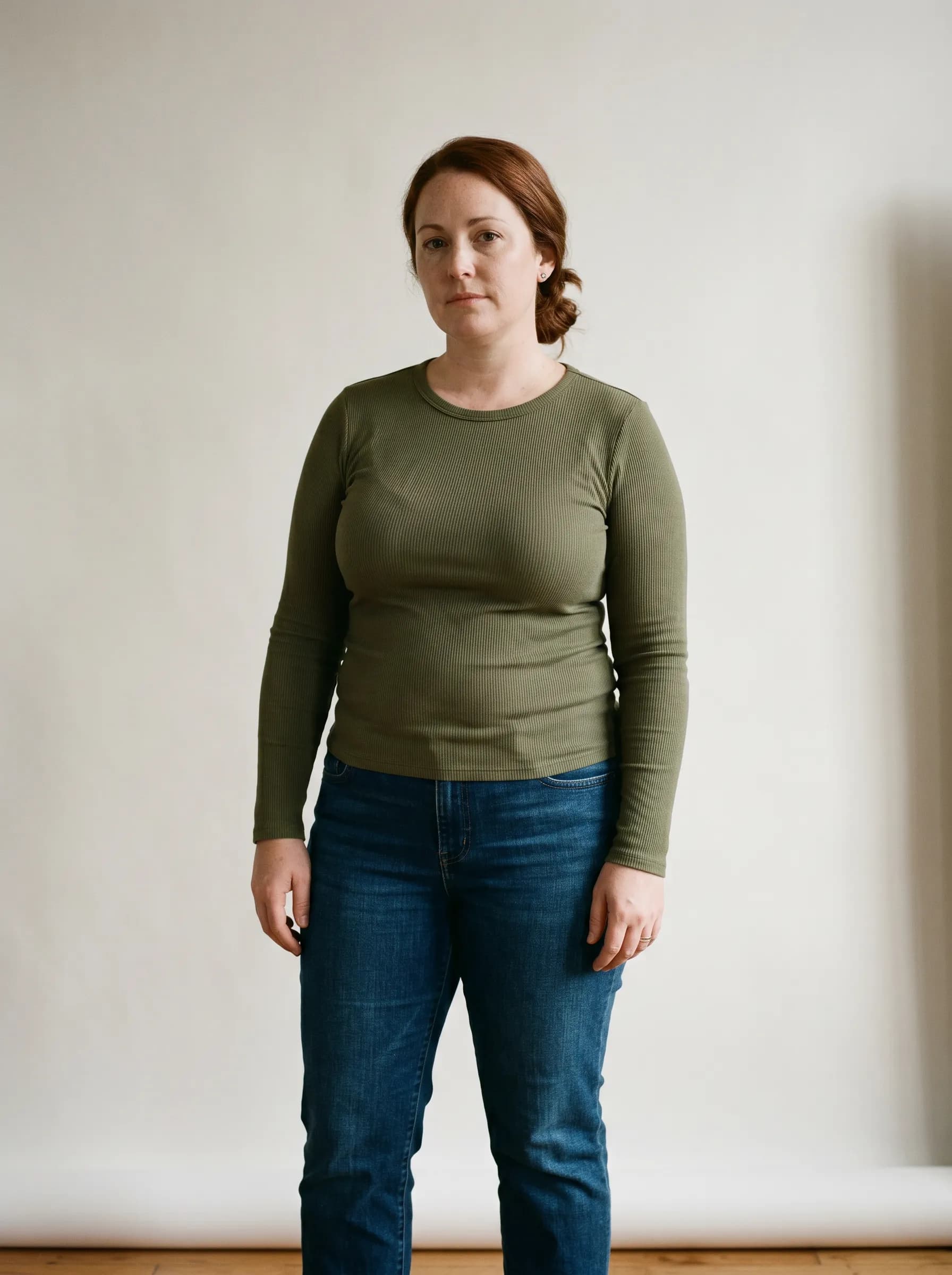 Editorial reconstruction of Jordan at baseline before her lifestyle-only protocol, neutral studio backdrop